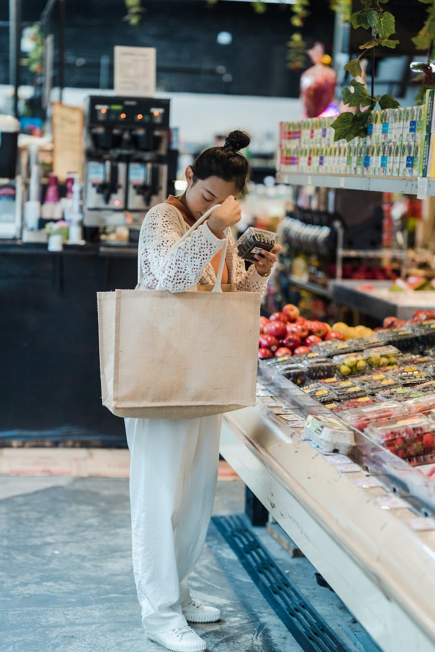 woman buying groceries in a supermarket